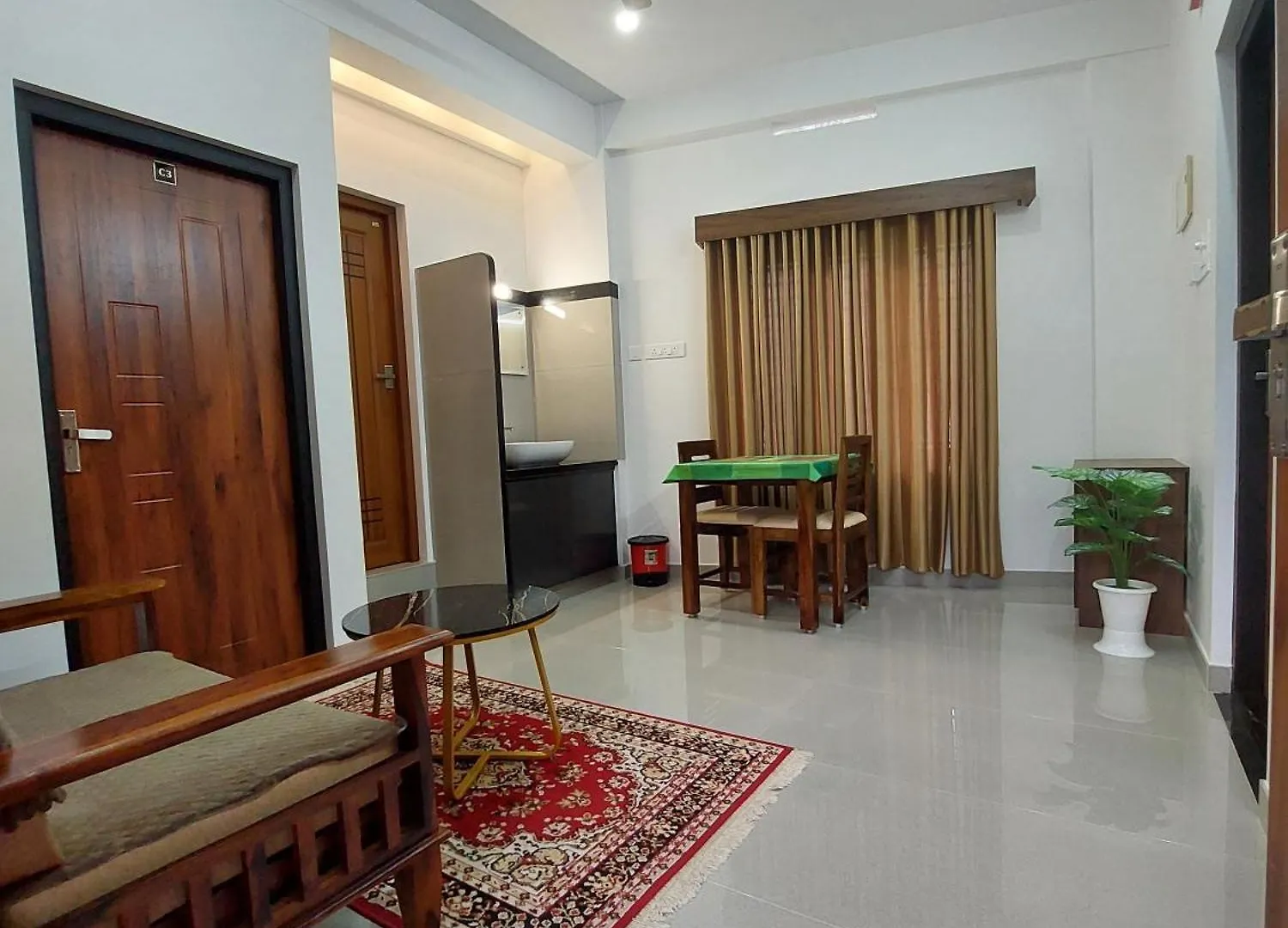 Achandy Arcade Kakkadampoyil Apartamento